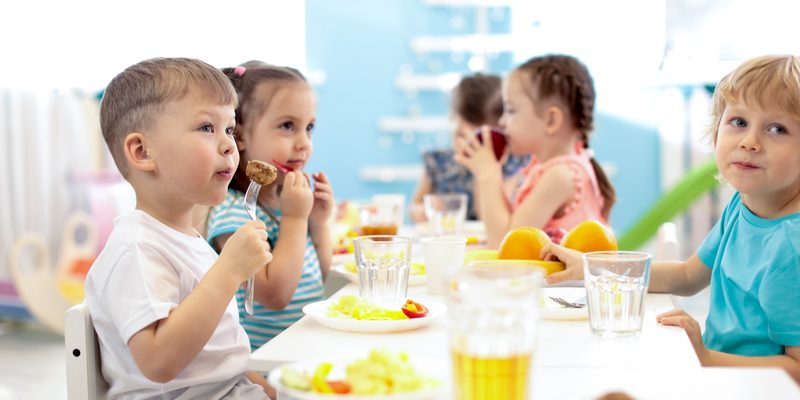 young children eating healthy food