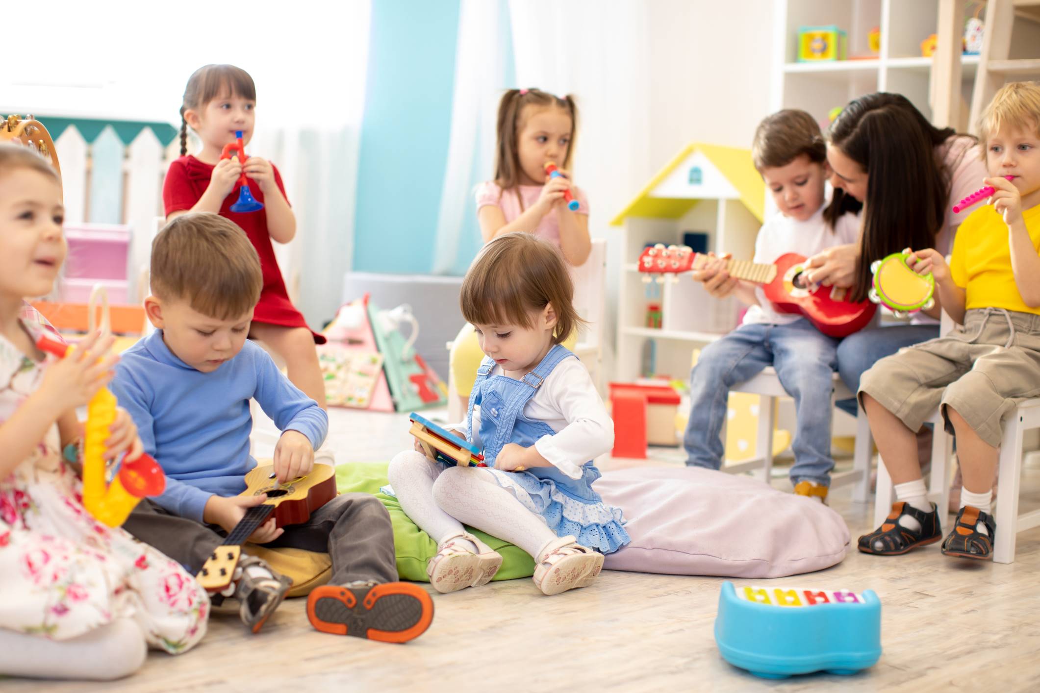 Burrendale Day Nursery 23 children playing with musical instruments