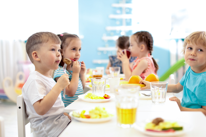 young children eating healthy food