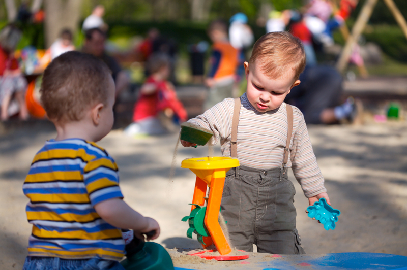 playing in the sand pit